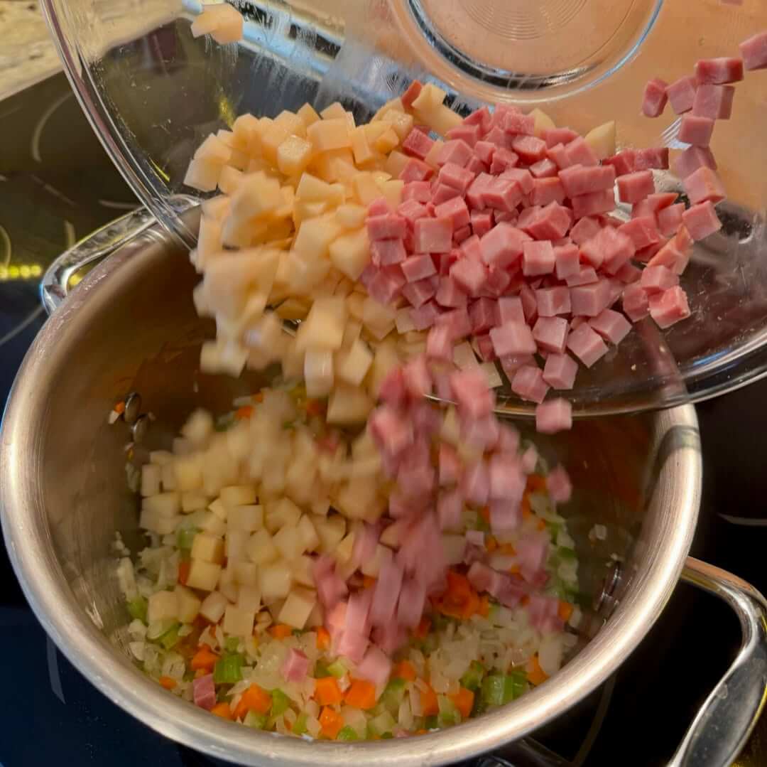 Adding potatos and bacon