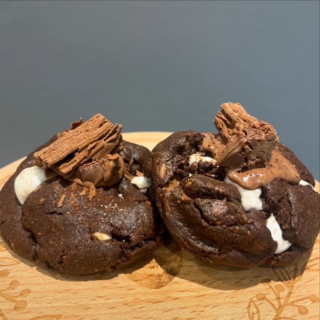 Keep cookies in a container with a slice of bread. Keep them soft