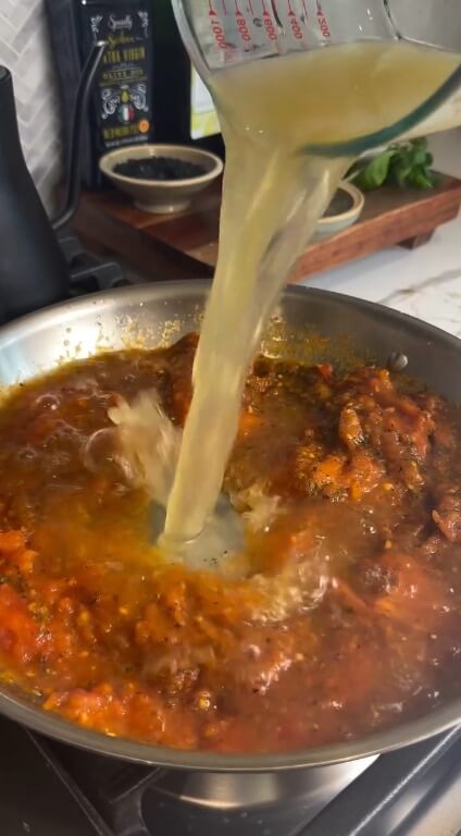 Adding chicken broth