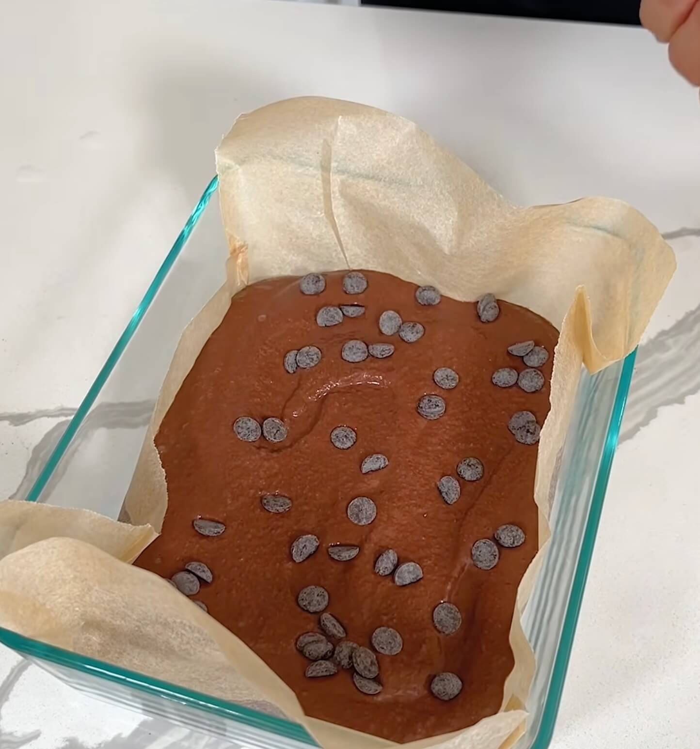 Adding chocolate chips